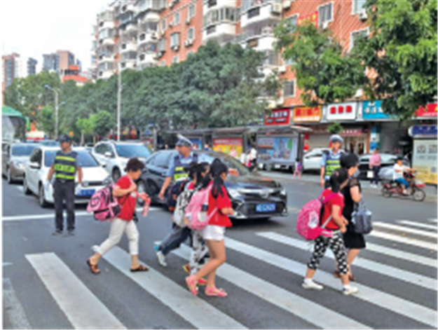 我市交警多措并举筑牢校园交通安全“防护网”——九房网